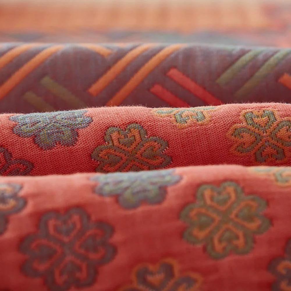 Liora Quilt — Vendbart Bomuldspatchwork Tæppe med Boho-Stil
