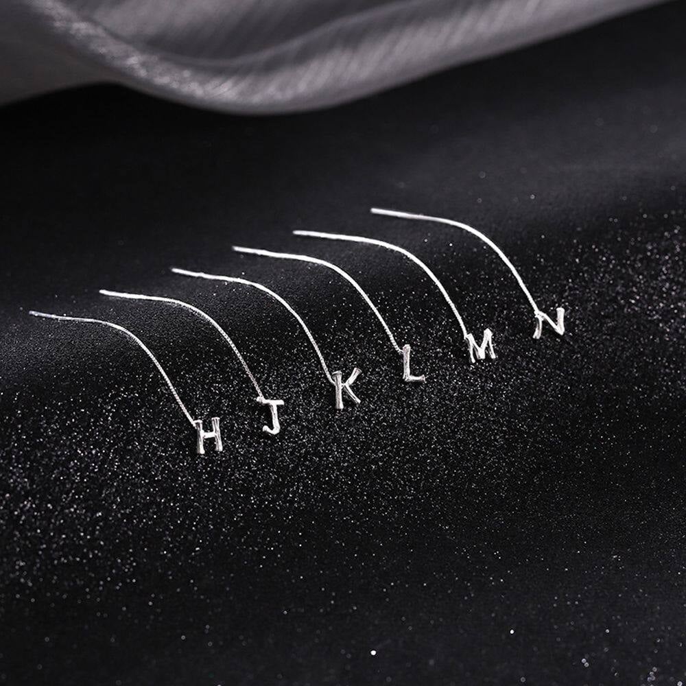 GlintAura™ Alfabet Oorbellen — Trek de aandacht met jouw kenmerkende sprankeling