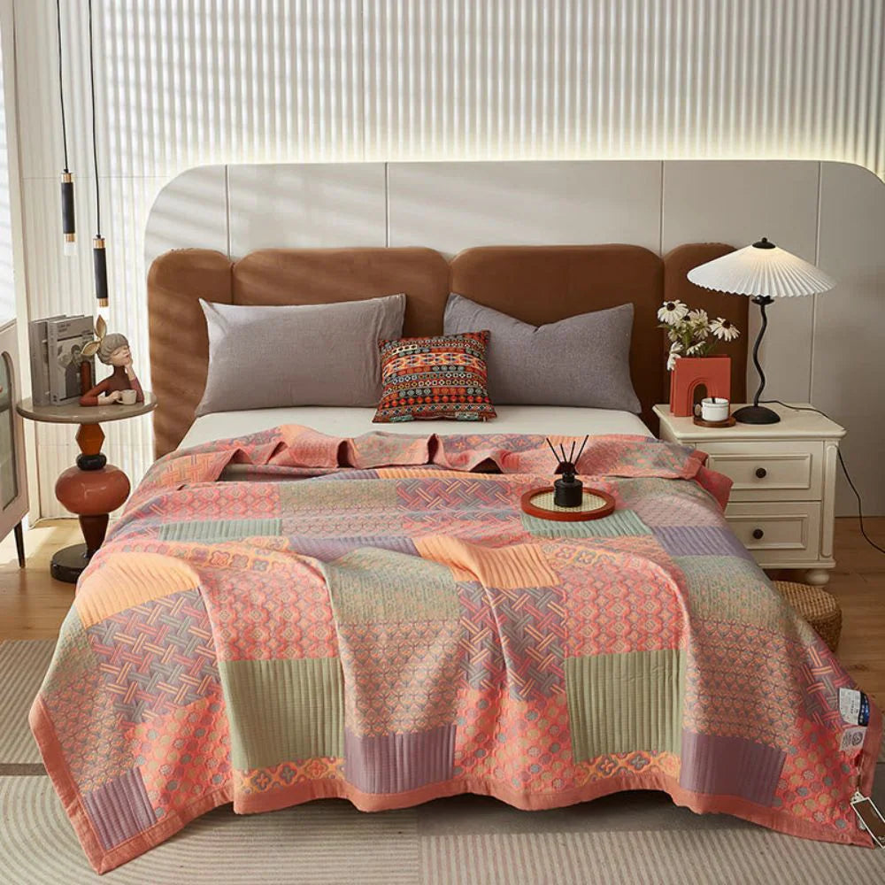 Liora Quilt — Vendbart Bomuldspatchwork Tæppe med Boho-Stil