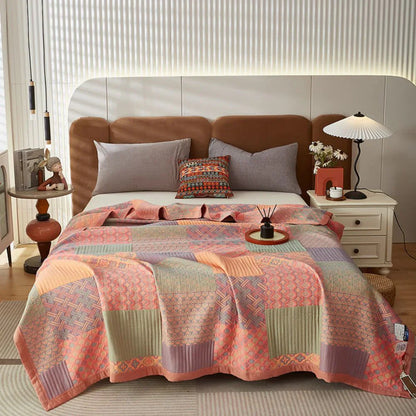 Liora Quilt — Vendbart Bomuldspatchwork Tæppe med Boho-Stil