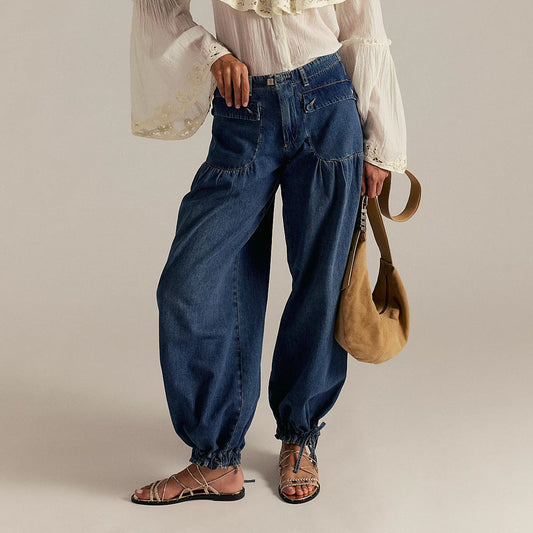 Liora — Weit geschnittene Baumwoll-Denim-Jeans mit plissierten Taschen