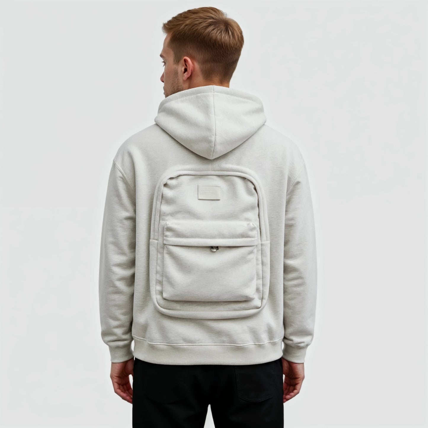 Tazzi — Travel Jacket with Built-in Backpack for Lightweight Carry