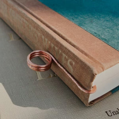 Maren — Apribook in metallo con fermapagina a una mano per una lettura comoda