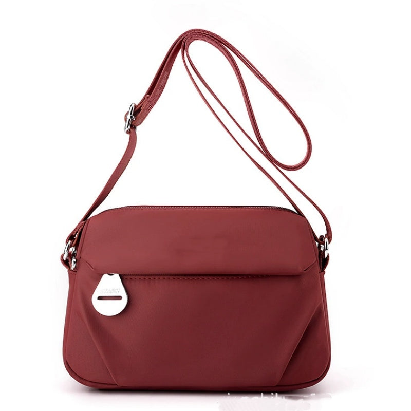 Larenza — Lightweight Waterproof Shoulder Bag with Convertible Strap